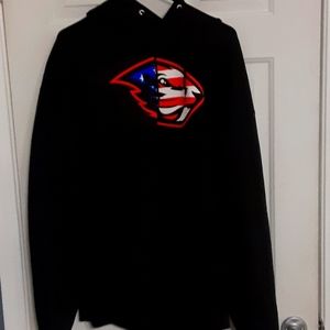 A beaver america symbol and a champion logo on the sleeve and its 2XL